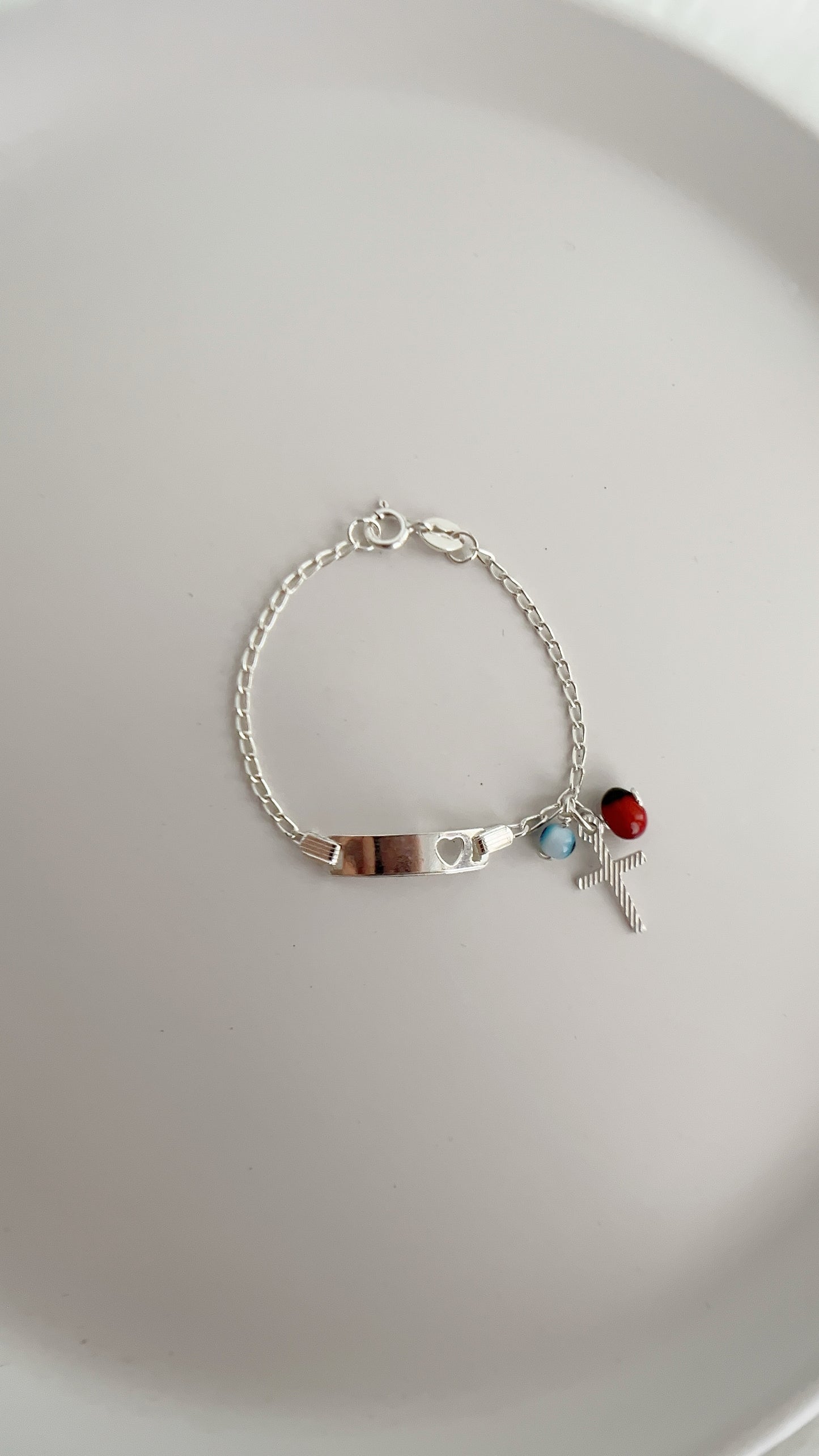 Esclava Corazon con Dijes Pionia, Ojo y Cruz - Plata 925