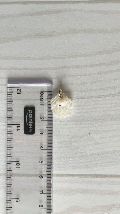 Dije Concha y Perla Plata 925